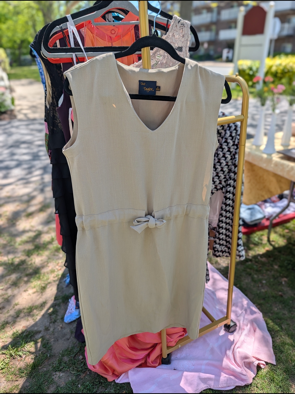 Just Taylor Sleeveless Cream Bow-Front Sheath Dress